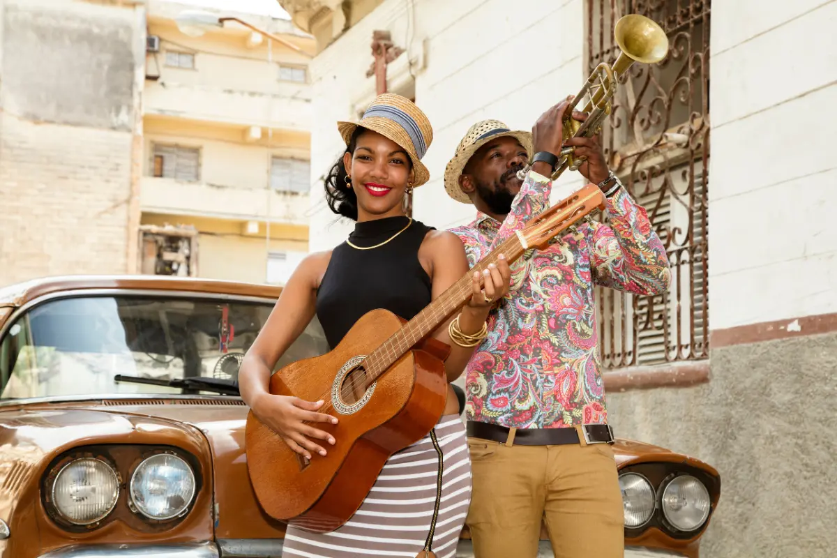 A&R team strategies for musicians include embracing cultural influences, represented by this vibrant duo performing with a guitar and trumpet.